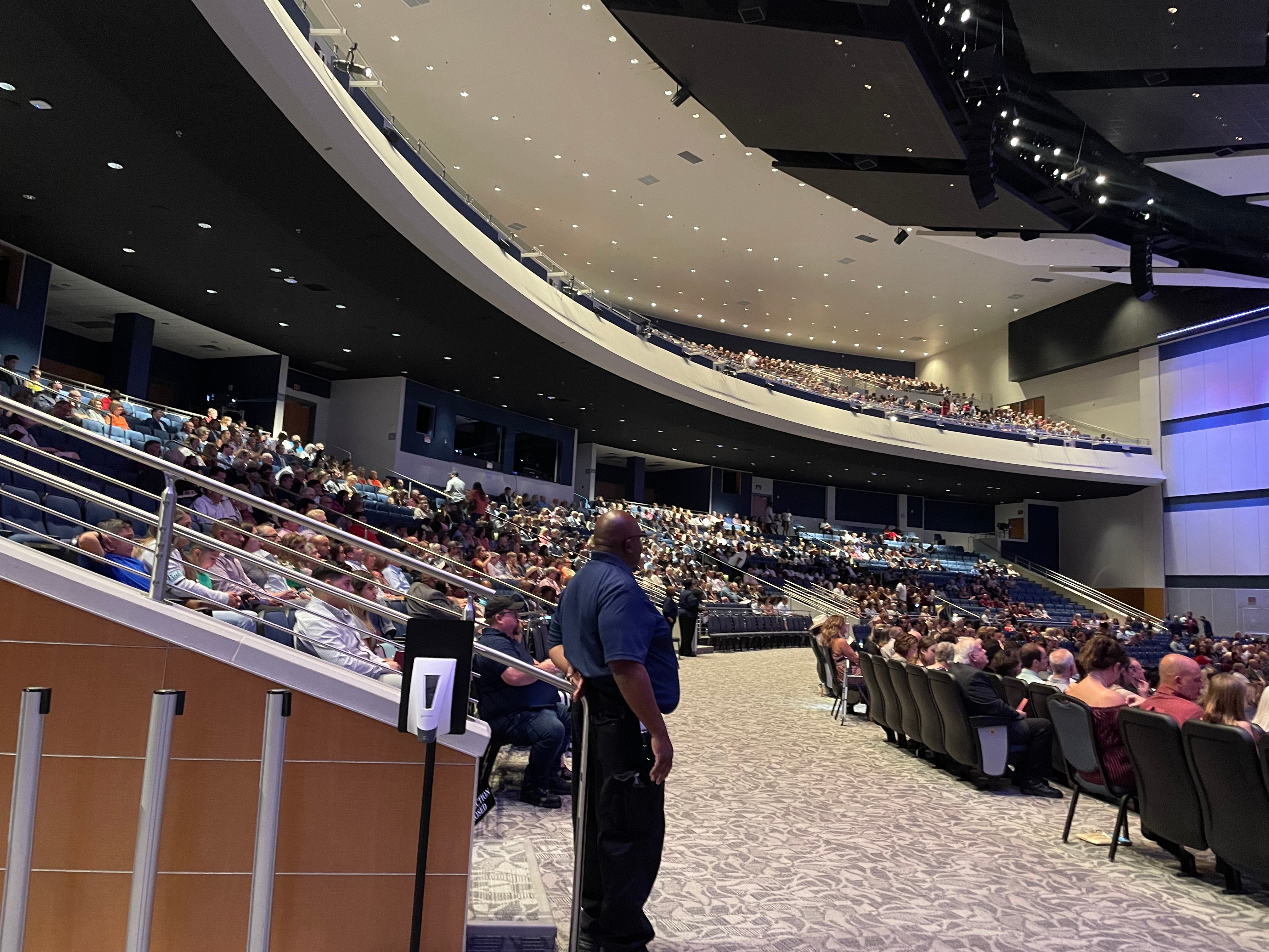 Inside auditorium looking at guest seating.